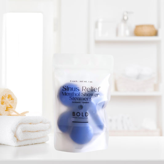 Sinus Relief aromatherapy shower steamers styled in bright spa-inspired bathroom setting