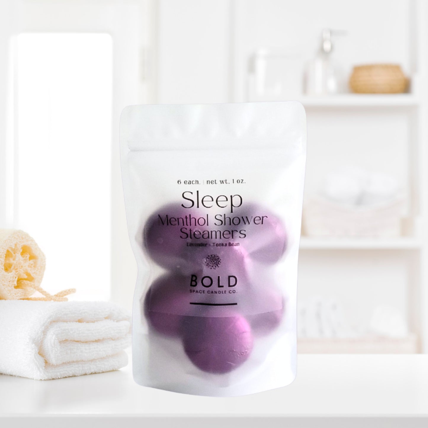 Sleep aromatherapy shower steamers styled in calming bathroom setting for nighttime routines