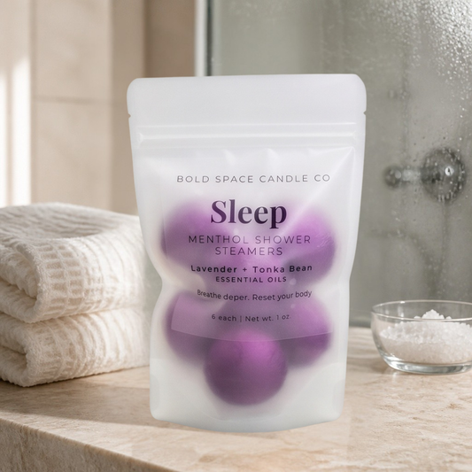 Pack of Bold Space Candle Co Sleep Menthol Shower Steamers on a bathroom counter.