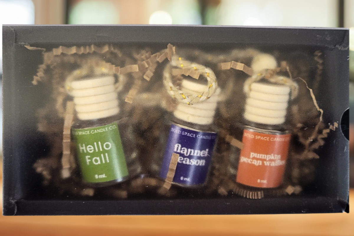 3 pack of fall car diffusers in a decorative box with autumn-themed labels.