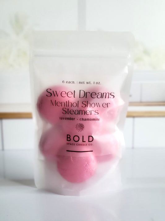 Lavender and Chamomile shower steamers offer relaxation. 6 in a pack. Wrapped in pink foil