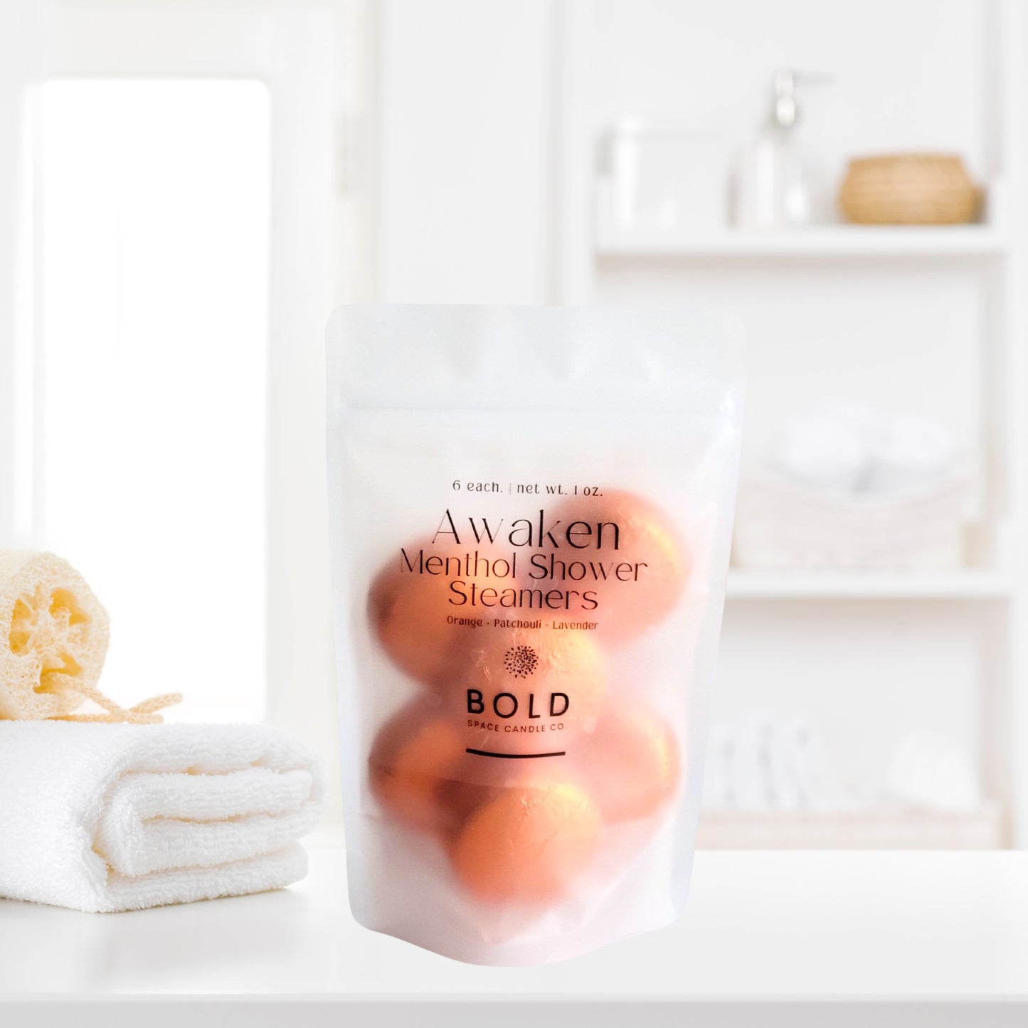 Citrus and lavender shower steamers styled in fresh spa-inspired bathroom setting