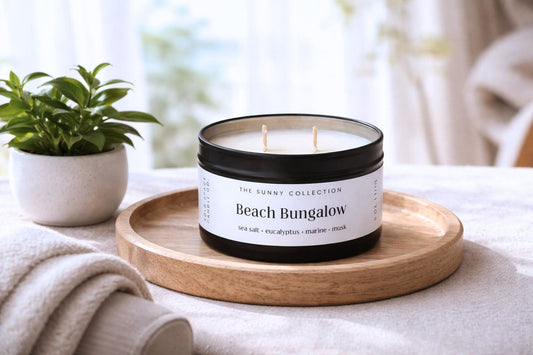 Beach Bungalow 6 oz soy candle in matte black tin with coastal sea salt eucalyptus scent
