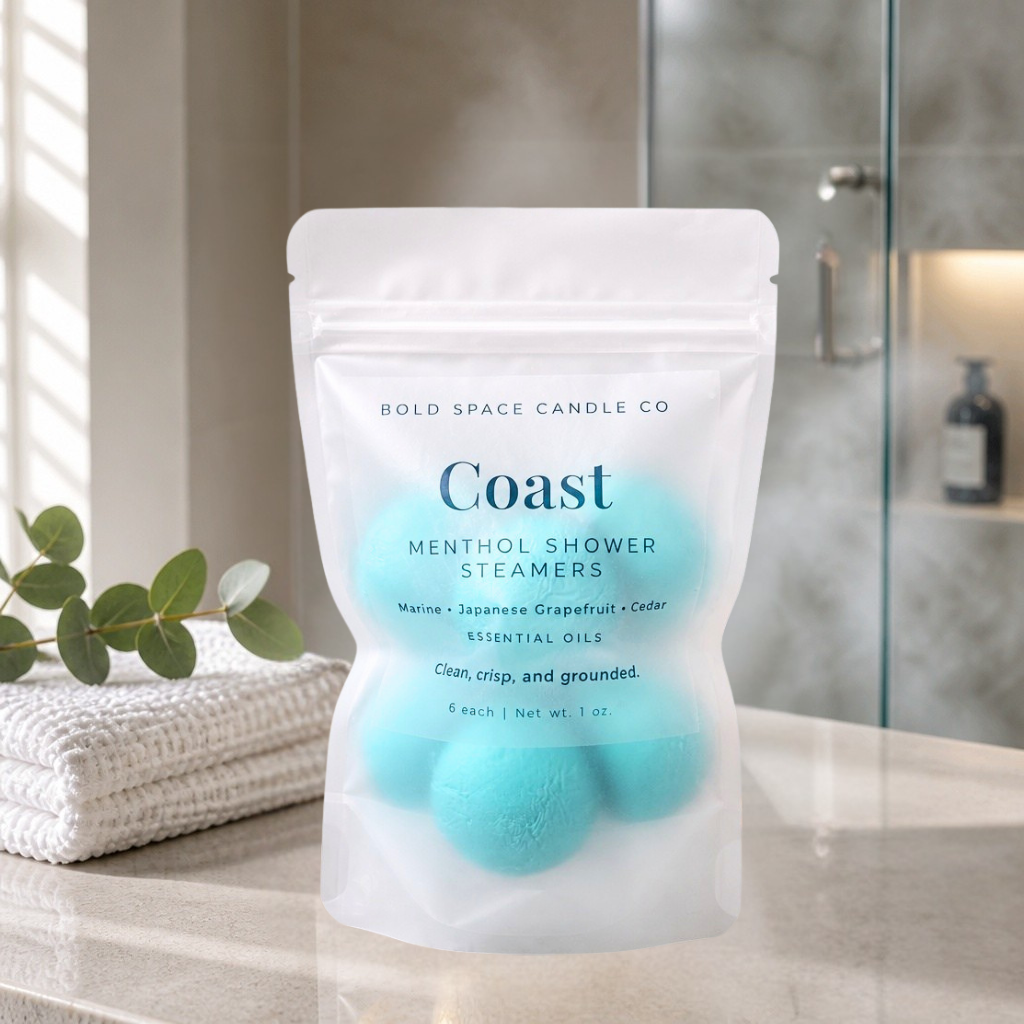 6 pack of shower steamers on bathroom counter, called Coast