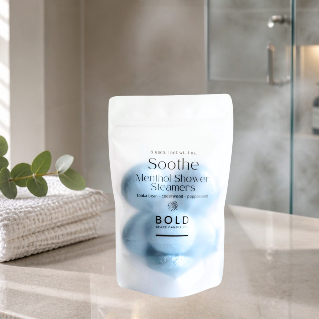 Soothe Menthol Shower Steamers Bold package on a bathroom counter with steam in the background