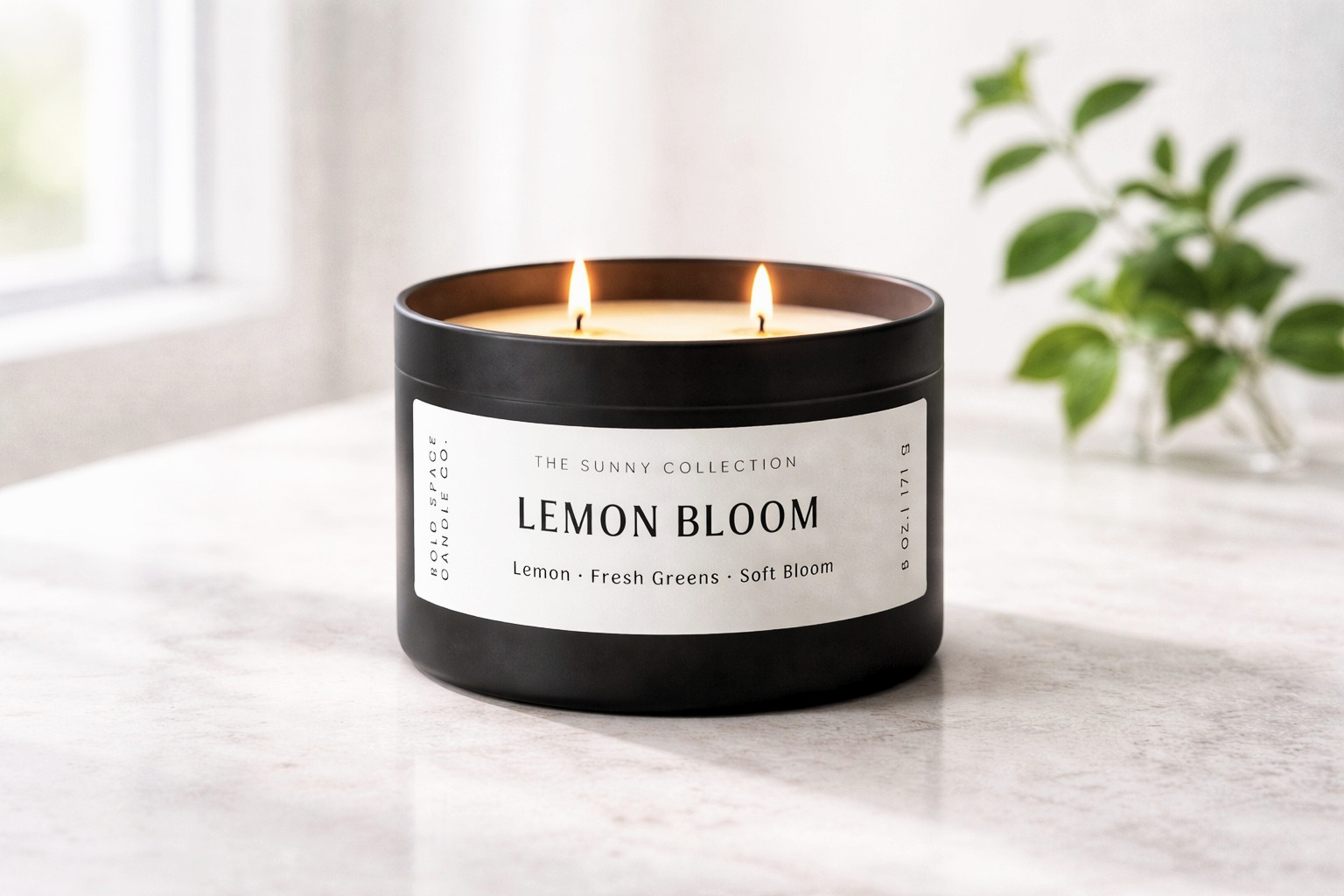 Lemon Bloom black tin with fresh lemon and soft floral scent, clean spring home fragrance