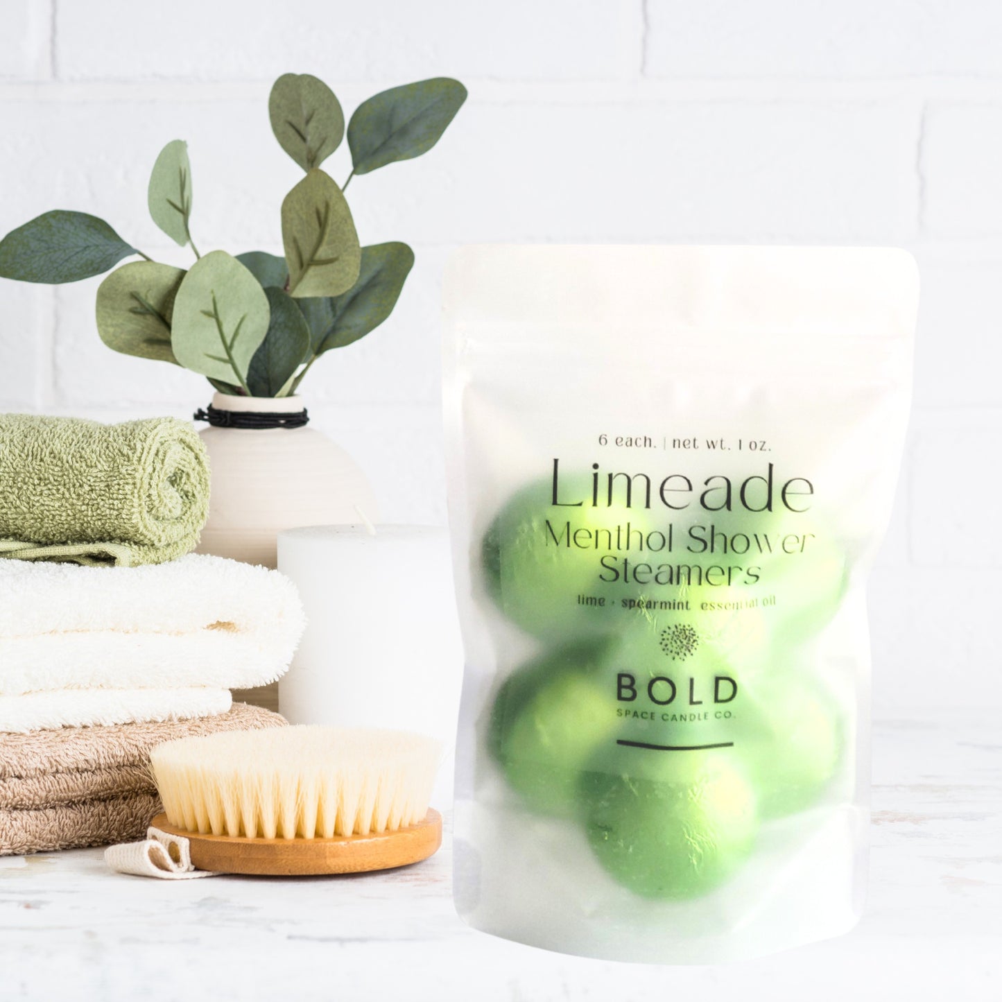 Limeade menthol shower steamers with lime and spearmint in frosted shower steamer pouch