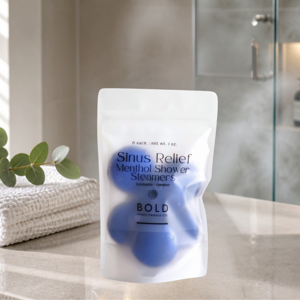 Pack of Sinus Relief Menthol Shower Steamers on a bathroom counter with a blurred background