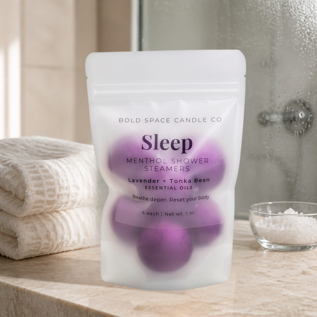 Pack of Bold Space Candle Co Sleep Menthol Shower Steamers on a bathroom counter.