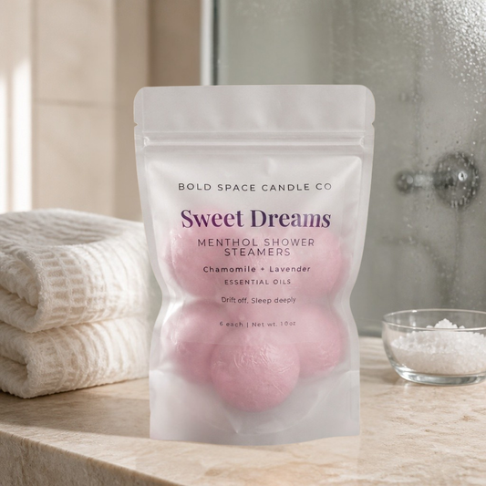 Package of 'Sweet Dreams' menthol shower steamers by Bold Space Candle Co on a bathroom counter.