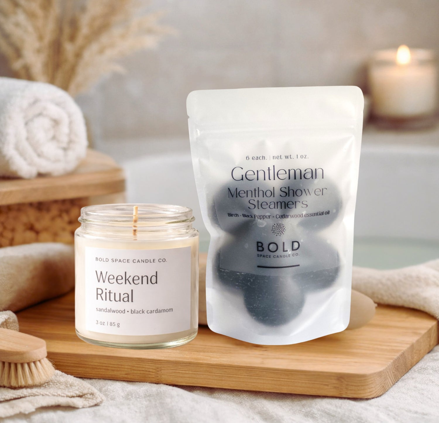 Gentleman shower steamers and Weekend Ritual sandalwood candle in bathroom with lit candles for daily self care routine
