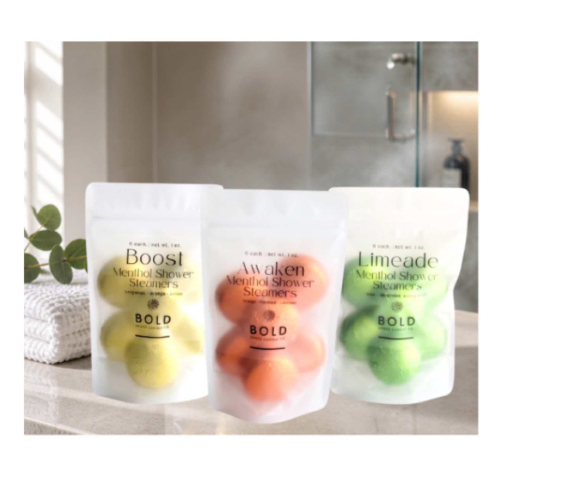 Three packages of Citrus Menthol Shower Steamers on a bathroom counter.